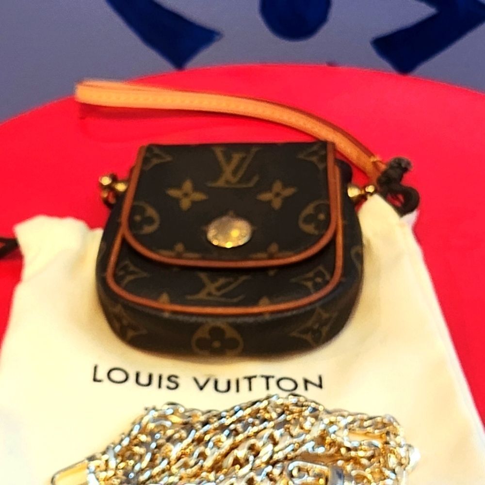 Louis Vuitton Pochette Cancun Monogram Mini Bag